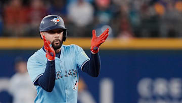 Oct 17, 2025; Seattle, Washington, USA; Toronto Blue Jays second baseman Isiah Kiner-Falefa (7) reacts after hitting a double against the Seattle Mariners in the third inning during game five of the ALCS round for the 2025 MLB playoffs at T-Mobile Park. Mandatory Credit: Stephen Brashear-Imagn Images