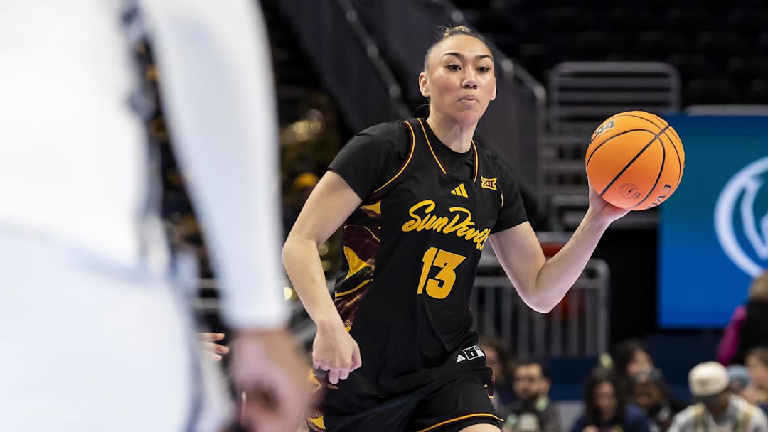Mar 6, 2026; Kansas City, MO, USA; Arizona State guard Last-Tear Poa (13) passes the ball against West Virginia during the second half at T-Mobile Center. Mandatory Credit: Nick Tre. Smith-Imagn Images
