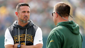 Green Bay Packers head coach Matt LaFleur, left, talks with general manager Brian Gutekunst during practice