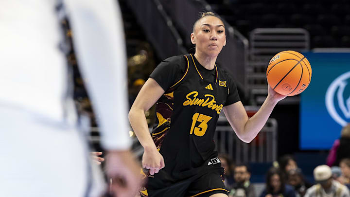 Mar 6, 2026; Kansas City, MO, USA; Arizona State guard Last-Tear Poa (13) passes the ball against West Virginia during the second half at T-Mobile Center. Mandatory Credit: Nick Tre. Smith-Imagn Images