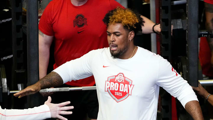 Ohio State Buckeyes offensive lineman Josh Simmons gets high fives after lifting during the pro day for NFL scouts at the Woody Hayes Athletic Cente on March 26, 2025.