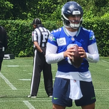 Quarterback Sam Howell prepares for a drill during the Seahawks fifth OTA practice at the VMAC.