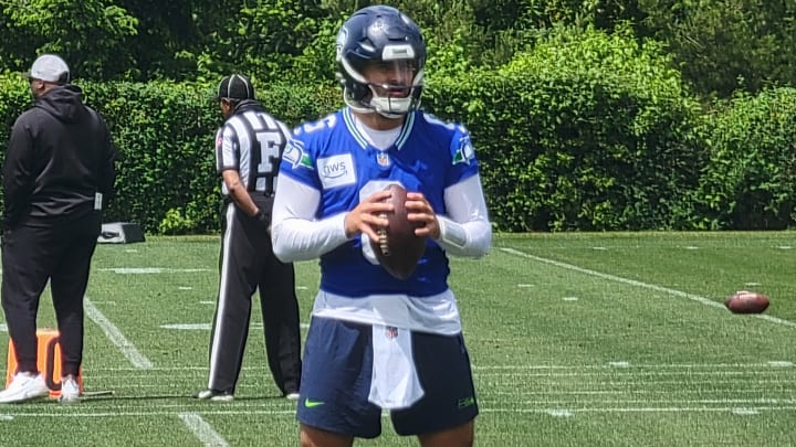 Quarterback Sam Howell prepares for a drill during the Seahawks fifth OTA practice at the VMAC.