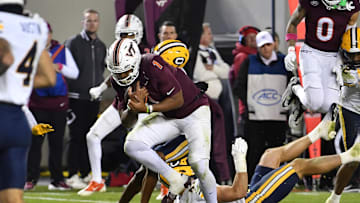 Oct 24, 2025; Blacksburg, Va.; Virginia Tech quarterback Kyron Drones (1) runs the ball for a touchdown against California.