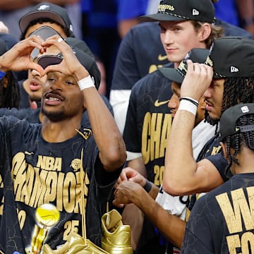 Jun 22, 2025; Oklahoma City, Oklahoma, USA; Oklahoma City Thunder guard Shai Gilgeous-Alexander (2) holds up a heart for fans at the end of game seven of the 2025 NBA Finals after defeating the Indiana Pacers at Paycom Center. Mandatory Credit: Alonzo Adams-Imagn Images