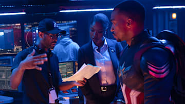 (L-R): Director Julius Onah, Xosha Roquemore, and Anthony Mackie behind the scenes of Marvel Studios' CAPTAIN AMERICA: BRAVE NEW WORLD. Photo by Eli Adé. © 2024 MARVEL.
