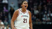 Nov 16, 2025; Hartford, Connecticut, USA; UConn Huskies forward Sarah Strong (21) reacts after a play against the Ohio State Buckeyes in the first half at Peoples Bank Arena. Mandatory Credit: David Butler II-Imagn Images