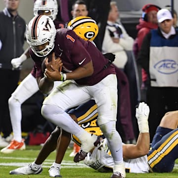 Oct 24, 2025; Blacksburg, Va.; Virginia Tech quarterback Kyron Drones (1) runs the ball for a touchdown against California.
