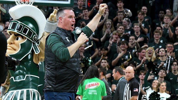 Dec 2, 2025; East Lansing, Michigan, USA;  Michigan State head football coach Pat Fitzgerald watches the Spartans defeat the Iowa Hawkeyes at Jack Breslin Student Events Center. Mandatory Credit: Dale Young-Imagn Images