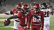 Nov 29, 2025; Pullman, Washington, USA; Washington State Cougars running back Angel Johnson (1) celebrates a a touchdown against the Oregon State Beavers in the second half at Gesa Field at Martin Stadium. Washington State Cougars won 32-8. Mandatory Credit: James Snook-Imagn Images