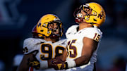 Arizona State Sun Devils defensive linemen Elijah O'Neal (15) and Jacob Rich Kongaika (98).