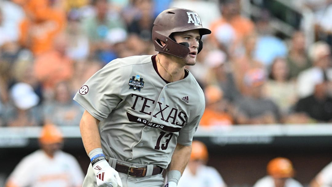Texas A&M Aggies left fielder Caden Sorrell (13) drives in a run against the Tennessee Volunteers during the first inning at Charles Schwab Field Omaha.