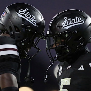 Mississippi State Bulldogs defensive back Kelley Jones (1) and defensive back Stonka Burnside (5) react during the second quarter against the Arizona State Sun Devils at Davis Wade Stadium at Scott Field.