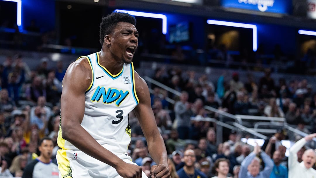 Apr 2, 2025; Indianapolis, Indiana, USA; Indiana Pacers center Thomas Bryant (3) celebrates his made basket in the second half against the Charlotte Hornets at Gainbridge Fieldhouse. Mandatory Credit: Trevor Ruszkowski-Imagn Images