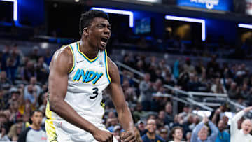 Apr 2, 2025; Indianapolis, Indiana, USA; Indiana Pacers center Thomas Bryant (3) celebrates his made basket in the second half against the Charlotte Hornets at Gainbridge Fieldhouse. Mandatory Credit: Trevor Ruszkowski-Imagn Images