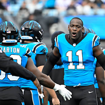 Oct 26, 2025; Charlotte, North Carolina, USA; Carolina Panthers linebacker Nic Scourton (11) runs on to the field before the game at Bank of America Stadium. Mandatory Credit: Bob Donnan-Imagn Images