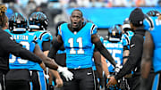 Oct 26, 2025; Charlotte, North Carolina, USA; Carolina Panthers linebacker Nic Scourton (11) runs on to the field before the game at Bank of America Stadium. Mandatory Credit: Bob Donnan-Imagn Images