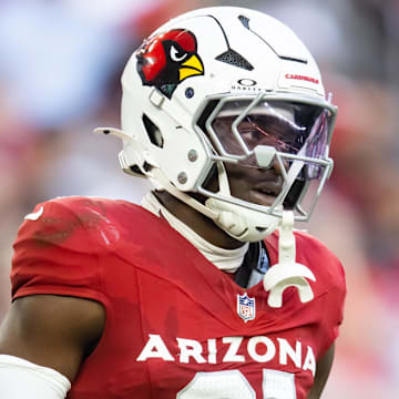Jan 5, 2025; Glendale, Arizona, USA; Arizona Cardinals cornerback Garrett Williams (21) against the San Francisco 49ers at State Farm Stadium. Mandatory Credit: Mark J. Rebilas-Imagn Images