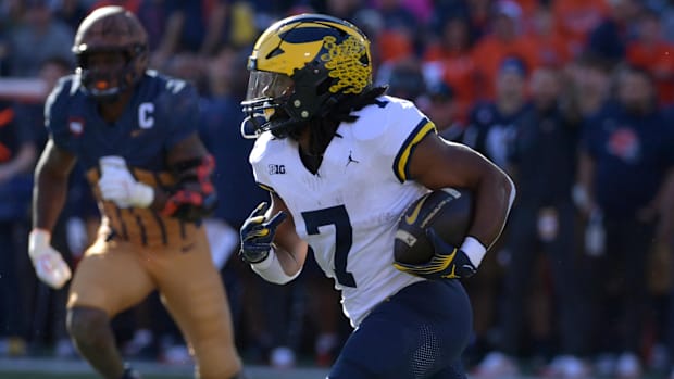 Donovan Edwards runs the ball