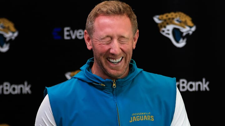 Jacksonville Jaguars head coach Liam Coen laughs with media members after speaking at the lectern during a press conference at the Miller Electric Center, Monday, April 20, 2026 in Jacksonville, Fla.