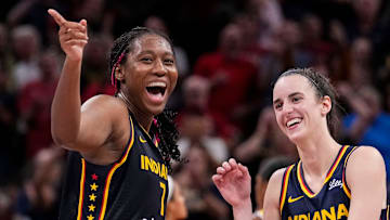 Indiana Fever forward Aliyah Boston (7) celebrates with Indiana Fever guard Caitlin Clark (22) altering recording a triple-double Wednesday, Sept. 4, 2024, during the game at Gainbridge Fieldhouse in Indianapolis. The Indiana Fever defeated the Los Angeles Sparks, 93-86.