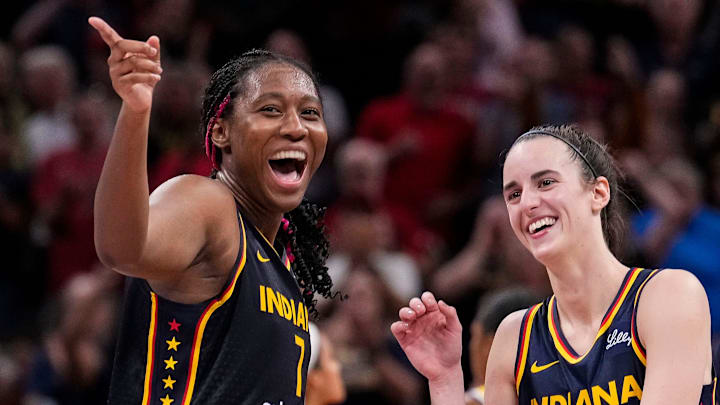 Indiana Fever forward Aliyah Boston (7) celebrates with Indiana Fever guard Caitlin Clark (22) altering recording a triple-double Wednesday, Sept. 4, 2024, during the game at Gainbridge Fieldhouse in Indianapolis. The Indiana Fever defeated the Los Angeles Sparks, 93-86. Indiana Fever forward Aliyah Boston (7) celebrates with Indiana Fever guard Caitlin Clark (22) altering recording a triple-double Wednesday, Sept. 4, 2024, during the game at Gainbridge Fieldhouse in Indianapolis. The Indiana Fever defeated the Los Angeles Sparks, 93-86.