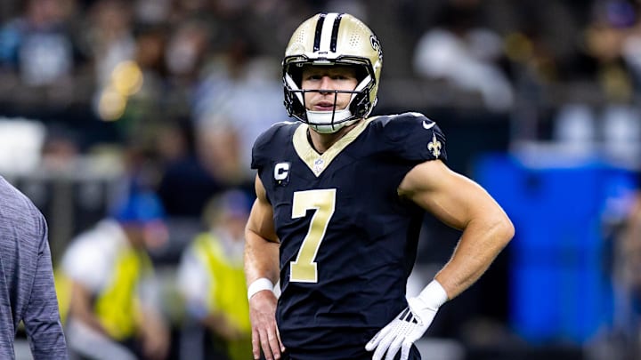 Sep 8, 2024; New Orleans, Louisiana, USA;  New Orleans Saints quarterback Taysom Hill (7) looks on against the Carolina Panthers during the pregame at Caesars Superdome. Mandatory Credit: Stephen Lew-Imagn Images