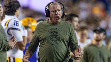 Nov 11, 2023; Baton Rouge, Louisiana, USA;  LSU Tigers head coach Brian Kelly walks the sideline against the Florida Gators during the first half at Tiger Stadium. Mandatory Credit: Stephen Lew-Imagn Images