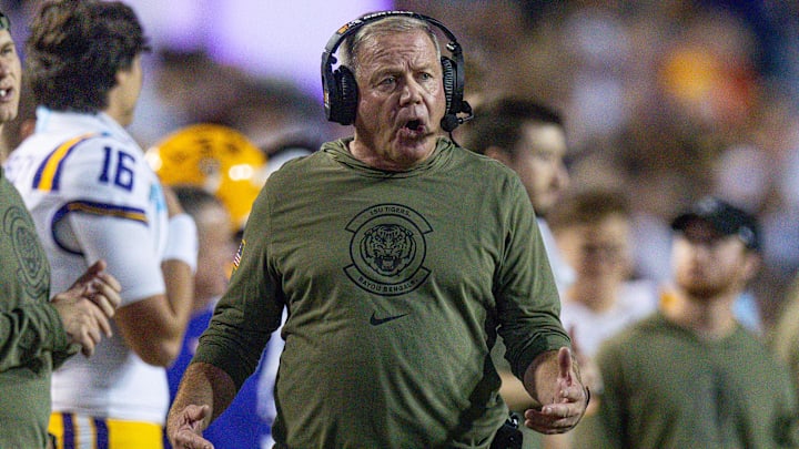 Nov 11, 2023; Baton Rouge, Louisiana, USA;  LSU Tigers head coach Brian Kelly walks the sideline against the Florida Gators during the first half at Tiger Stadium. Mandatory Credit: Stephen Lew-Imagn Images