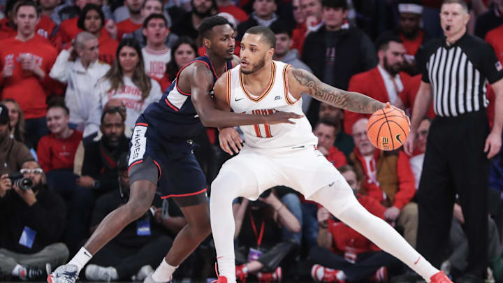 Feb 3, 2024; New York, New York, USA;  St. John's Red Storm center Joel Soriano (11) looks to post up against Connecticut Huskies forward Samson Johnson (35) in the first half at Madison Square Garden. Mandatory Credit: Wendell Cruz-Imagn Images