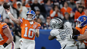 Nov 6, 2025; Denver, Colorado, USA; Denver Broncos quarterback Bo Nix (10) drops back to pass against the Las Vegas Raiders during the first half at Empower Field at Mile High. Mandatory Credit: Isaiah J. Downing-Imagn Images