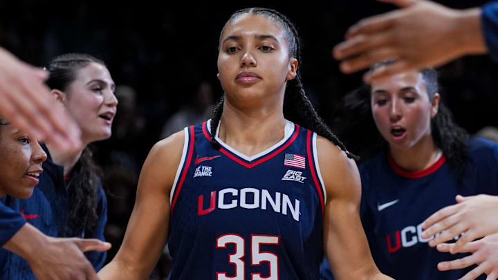 Nov 30, 2025; Cincinnati, Ohio, USA;  UConn Huskies guard Azzi Fudd (35) takes the court during player introductions before the game against the Xavier Musketeers at the Cintas Center. Mandatory Credit: Aaron Doster-Imagn Images
