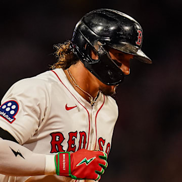 Boston Red Sox outfielder Jarren Duran (16) hits a home run against the Colorado Rockies in the seventh inning at Fenway Park on July 8.