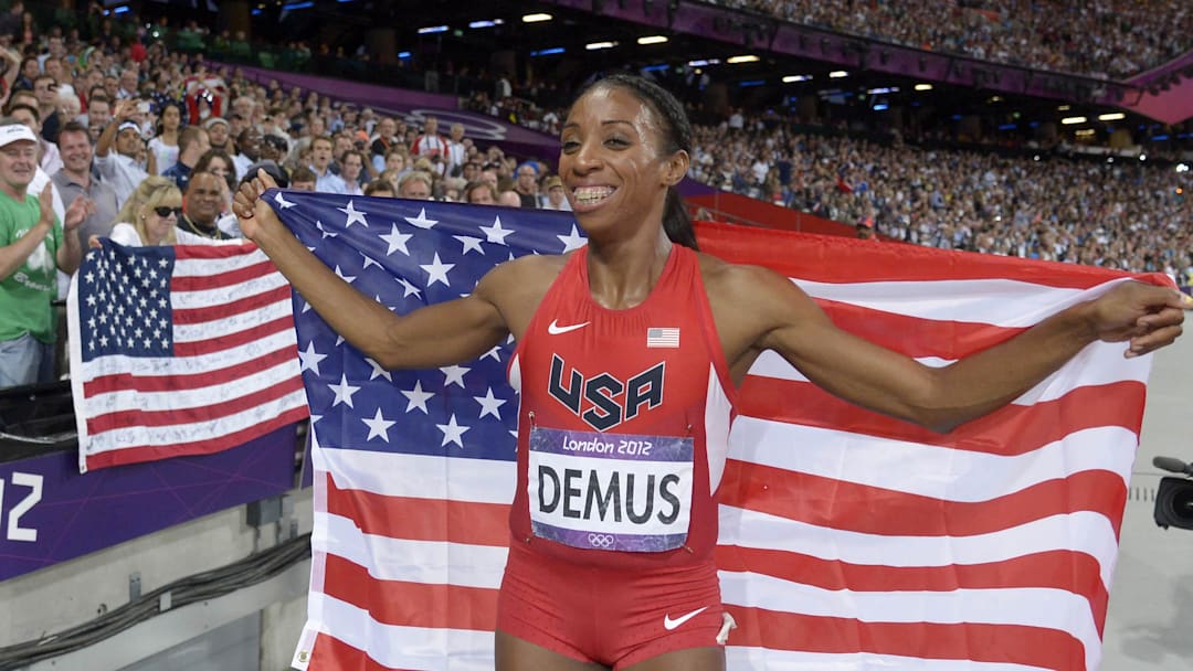 Aug 8, 2012; London, United Kingdom; Lashinda Demus (USA) takes a victory lap after finishing second in the women's 400m hurdles in 52.77 during the London 2012 Olympic Games at Olympic Stadium. Mandatory Credit: Kirby Lee-Imagn Images