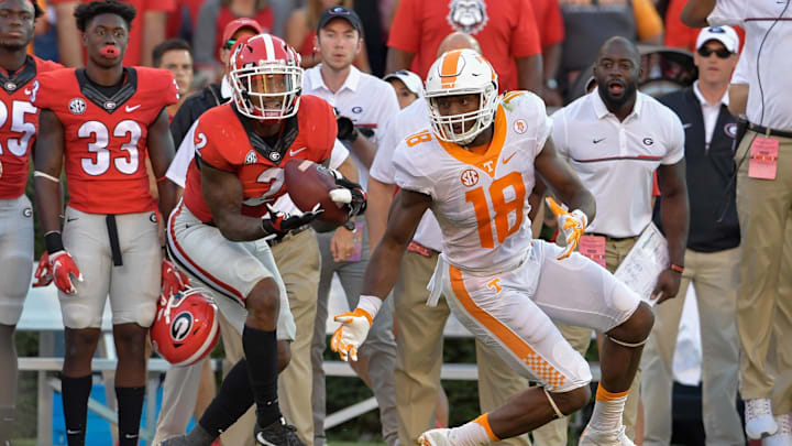 Oct 1, 2016; Athens, GA, USA; Georgia Bulldogs defensive back Maurice Smith (2) intercepts a pass in front of Tennessee Volunteers tight end Jason Croom (18) during the fourth quarter at Sanford Stadium. Tennessee defeated Georgia 34-31. Mandatory Credit: Dale Zanine-Imagn Images