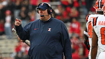 Oct 14, 2023; College Park, Maryland, USA;  Illinois Fighting Illini head coach Bret Bielema loos onto the field during the first half against the Maryland Terrapins at SECU Stadium. Mandatory Credit: Tommy Gilligan-Imagn Images