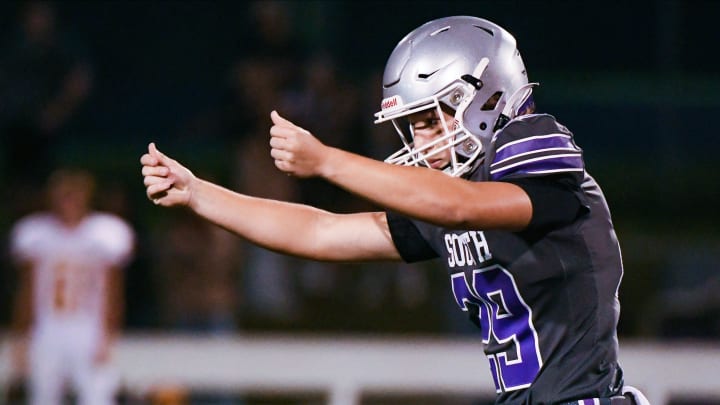 Bloomington South's Bryce Taylor (29) celebrates after making a field goal to tie the game with 1:16 left during the North-South football game at South on Friday, September 8, 2023.