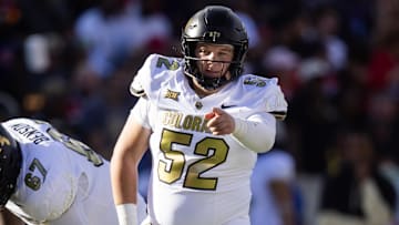 Oct 19, 2024; Tucson, Arizona, USA; Colorado Buffalos offensive lineman Cash Cleveland (52) against the Arizona Wildcats at Arizona Stadium. Mandatory Credit: Mark J. Rebilas-Imagn Images