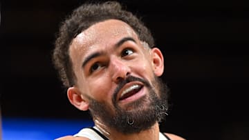Trae Young #11 of the Atlanta Hawks reacts against the Indiana Pacers.