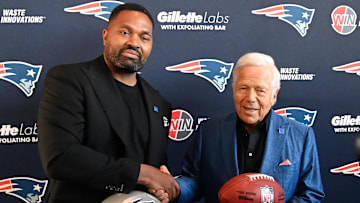 Jan 17, 2024; Foxborough, MA, USA; New England Patriots head coach Jerod Mayo (L) and owner Robert Kraft pose for photos after a press conference announcing Mayo's hiring as the team's head coach at Gillette Stadium. Mandatory Credit: Eric Canha-Imagn Images