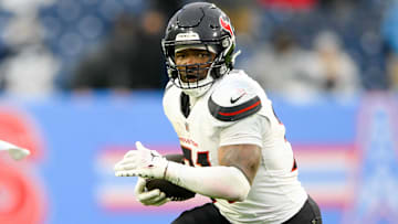 Houston Texans running back Dameon Pierce (31) runs the ball against the Tennessee Titans during the second half at Nissan Stadium.
