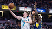 Nov 19, 2025; Indianapolis, Indiana, USA; Charlotte Hornets guard Kon Knueppel (7) shoots the ball 