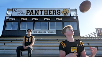 Newbury Park High quarterback Brady Smigiel poses for a photo with wide receiver Shane Rosenthal, who is committed to UCLA.
