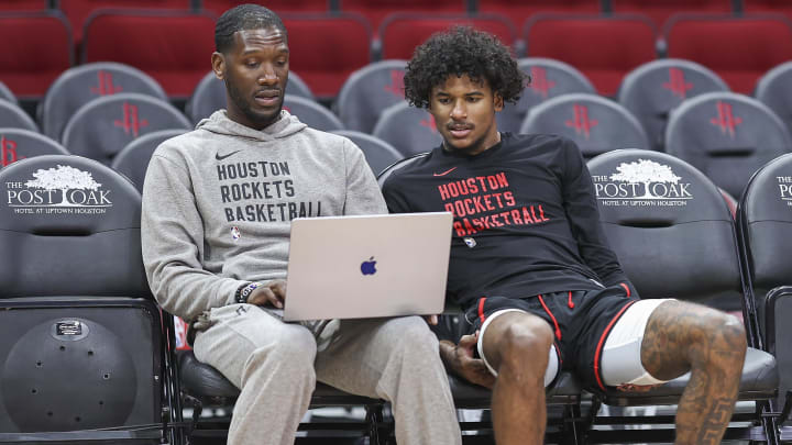 Apr 5, 2024; Houston, Texas, USA; Houston Rockets guard Jalen Green (right) talks with assistant coach Royal Ivey (left) before the game against the Miami Heat at Toyota Center. Mandatory Credit: Troy Taormina-USA TODAY Sports