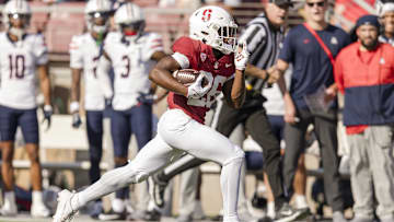 Sep 23, 2023; Stanford, California, USA; Stanford Cardinal running back Sedrick Irvin (26) runs the ball against the Arizona Wildcats during the first quarter at Stanford Stadium. Mandatory Credit: John Hefti-Imagn Images