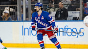 Mar 22, 2025; New York, New York, USA; New York Rangers left wing Chris Kreider (20) skates against the Vancouver Canucks during the first period at Madison Square Garden. Mandatory Credit: Danny Wild-Imagn Images