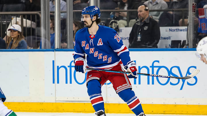 Mar 22, 2025; New York, New York, USA; New York Rangers left wing Chris Kreider (20) skates against the Vancouver Canucks during the first period at Madison Square Garden. Mandatory Credit: Danny Wild-Imagn Images