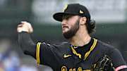 Jun 13, 2025; Chicago, Illinois, USA;  Pittsburgh Pirates pitcher Paul Skenes (30) delivers against the Chicago Cubs during the first inning at Wrigley Field. Mandatory Credit: Matt Marton-Imagn Images