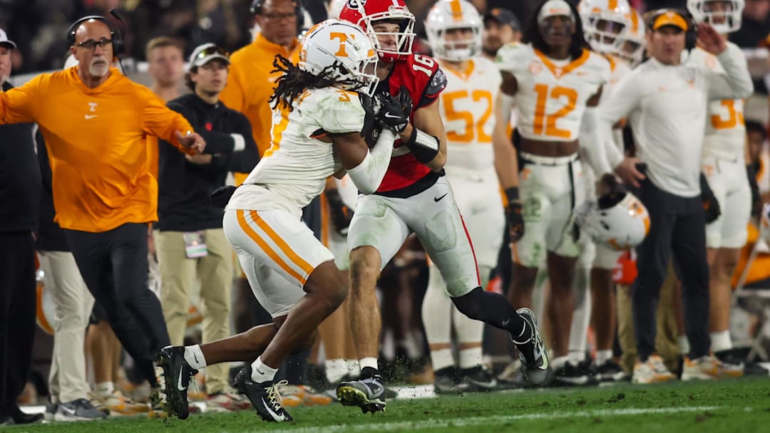Nov 16, 2024; Athens, Georgia, USA; Georgia Bulldogs wide receiver London Humphreys (16) catches a pass in front of Tennessee Volunteers defensive back Jermod McCoy (3).