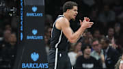 Oct 24, 2025; Brooklyn, New York, USA;  Brooklyn Nets forward Michael Porter Jr. (17) celebrates during a timeout in the fourth quarter against the Cleveland Cavaliers at Barclays Center. Mandatory Credit: Wendell Cruz-Imagn Images